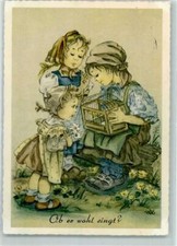 39168871 - Kinder mit einem Vogelkaefig Kanarienvogel ob er wohl singt AK