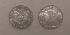 One SILVER DOLLAR 1.OZ 1987