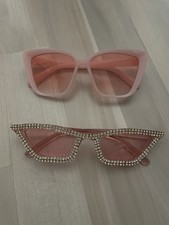Zwei Sonnenbrillen/ pink/