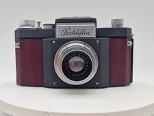 Praktiflex 1. Gen / kursiv / Schreibschrift / Kräusellack / ROT / Xenar 50mm 2.8