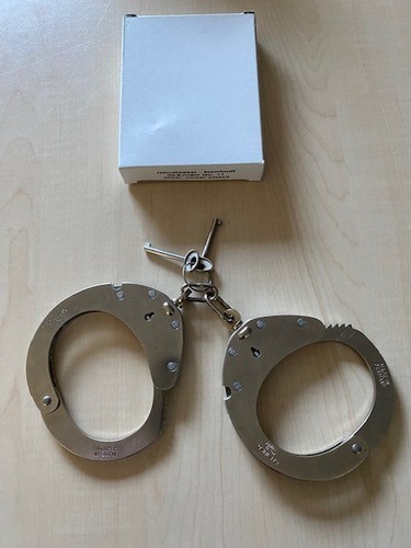 Handschellen-Handfesseln-Schli