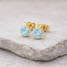 333 Gold Ohrstecker Blautopas