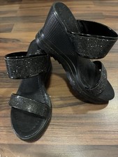 Schwarze Pantoletten mit