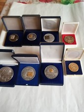 8 Orden, Plaketten, Medaillen