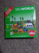 SIKU WORLD 5606 Fahrsilo mit Plane und Reifen + Granulat | Spielset  27x27cm