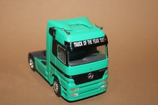 NZG  1:43   Zugmaschine MB Actros 1857 Truck of the Year 1997