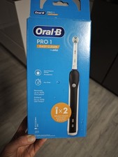 Oral-B PRO 1 Easy Clean Elektrische Zahnbürste + 2 Stück Aufsteckbürsten