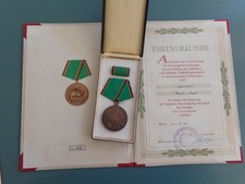 Urkunde mit Orden 1954 , KVP