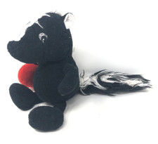 Plüschtier Stinktier mit Herz