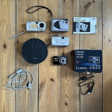 Konvolut Panasonic LUMIX, Sony Canon, Fujifilm, Saugroboter defekt Filmrequisite