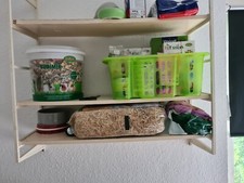 Meerschweinchenkäfig mit Futter u.s w