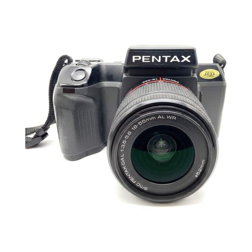 Pentax sf7 - +,