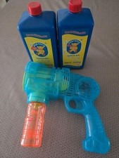 Seifenblasenpistole mit Pustefix Nachfüllflasche