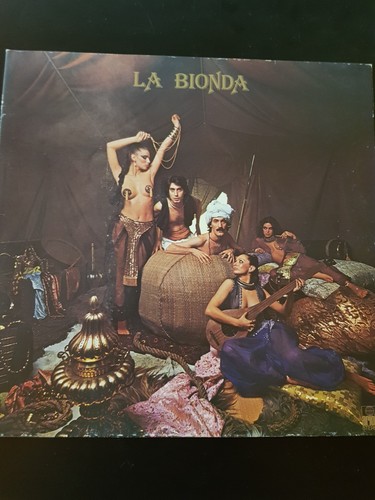 Bionda la - –,