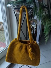 Handtasche, Tragetasche