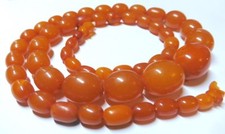 Echte Naturbernsteinkette, 51 Oliven, Ostsee, butterscotch, L. 53 cm, G. 23,3 g