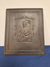 Alte Ofenplatte mit Motiv um