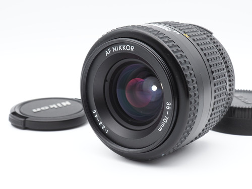 Near mint nikon af - [near, nikkor