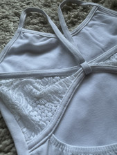 Balletttrikot mit besonderer Spitze und tollem Rückenausschnitt in weiß, Größe S