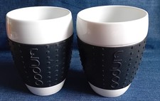 BODUM Pavina - 2 Becher PORZELLAN mit Silikonring in Schwarz - 0,35 l