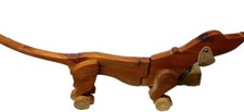 Holzdackel gelenkig mit  Lederohren zum Nachziehen für Kids