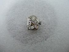 Uhrwerk Zenith (signiert Movado) + Zifferblatt, Zeiger und Krone 