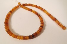 1 Strang Hornperlen FL88 7mm Perlen horn beads Asien Asia Braun Bernsteinfarben