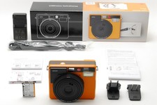[Fast neuwertig in BOX] Leica Sofort analoge Sofortbildkamera Orange 19102...