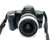 Minolta Dynax 303si + Minolta