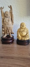 Buddha Figuren auf  Holzsockel