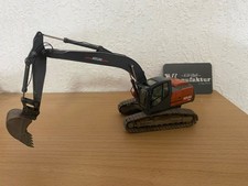 Raupenbagger ATLAS LC 225 gealtert NZG 1:50