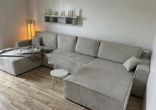 Große Eckcouch Sofalandschaft mit Bettfunktion, 9 Monate alt in beige