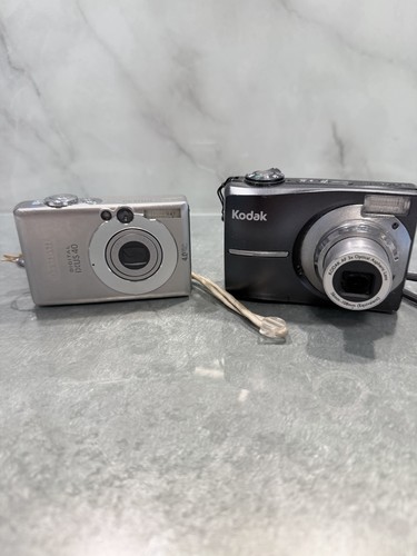 Canon ixus kodak - +,