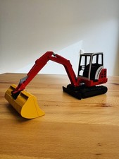 Bruder Schaeff CAT Bagger