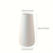 Eine Keramikblumenvase, Eine