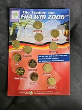 12 Medaillen im Folder ca