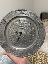 Elegante Zinn Wanduhr