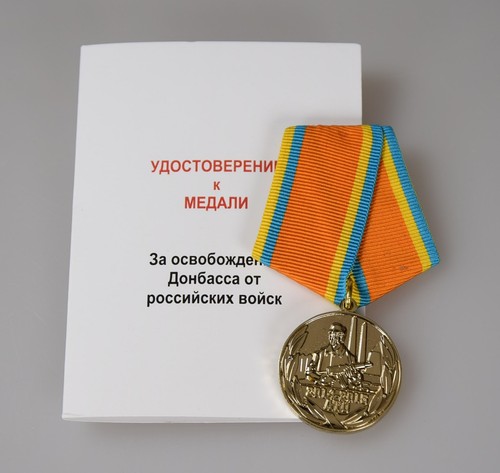 Medaille mit urkunde - medaille,