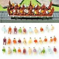 Figuren N sitzende Reisende