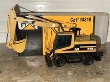 NZG Caterpillar Cat M318