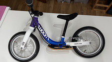 Woom 1 Laufrad Cosmic Purple mit Trittbrett und Tragetasche - Top Zustand