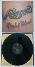 LP Poison Flesh & Blood Capitol Records 0647918131 von 1990 OIS Vinyl Near Mint