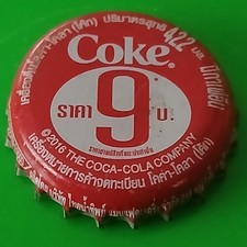 Coca Cola Kronkorken aus