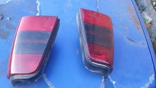 Schwarz/rote original Hella Rückleuchten für VW Golf 3 Variant