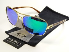 Oakley Sanctuary Gold Green Polarized Sonnenbrille Deviation Crosshair Contrail