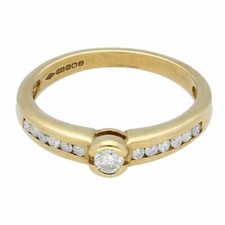 Ring 9 Karat Gelbgold 0,25 kt Diamant Solitär mit Akzenten (Größe K 1/2) 4 mm Kopf