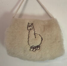 Wärmender Alpaka Muff für Kinder aus Alpakaflor mit Kordel zum Umhängen