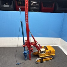 Kibri 10550, H0, Hydraulikbagger Liebherr R974 mit DELMAG Bohreinrichtung RH1413