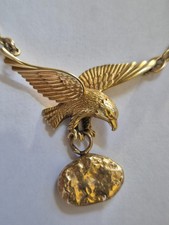 Halskette mit Adler der ein Goldnugget trägt, 585er Gold 14 Karat, Gewicht 31,1