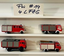 4 Feuerwehr-Löschfahrzeuge MB